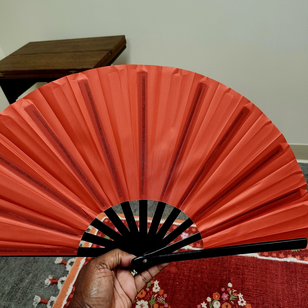 Vibrant Red Hand Fan with Black Handle